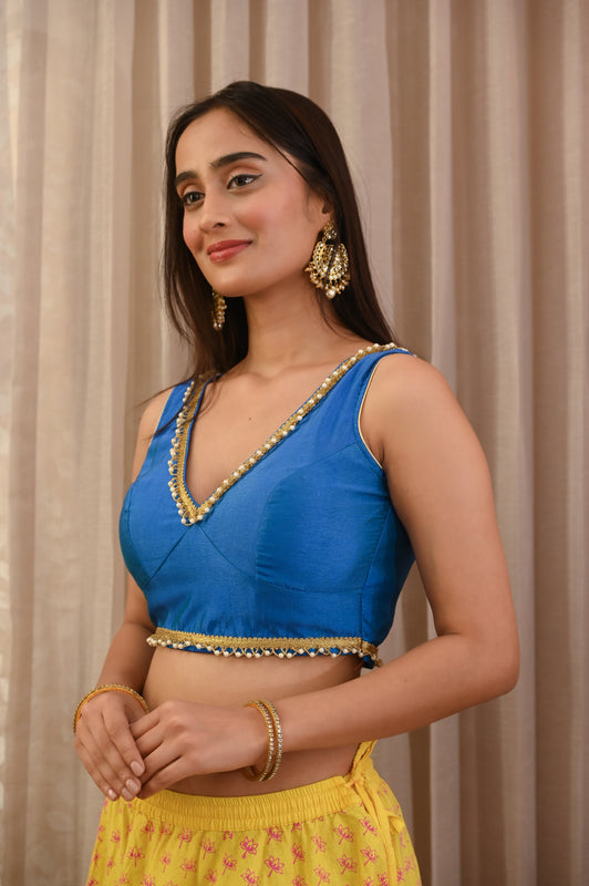 Blue Satin Silk Sleeveless Padded Blouse With Lace Embellished V Neck