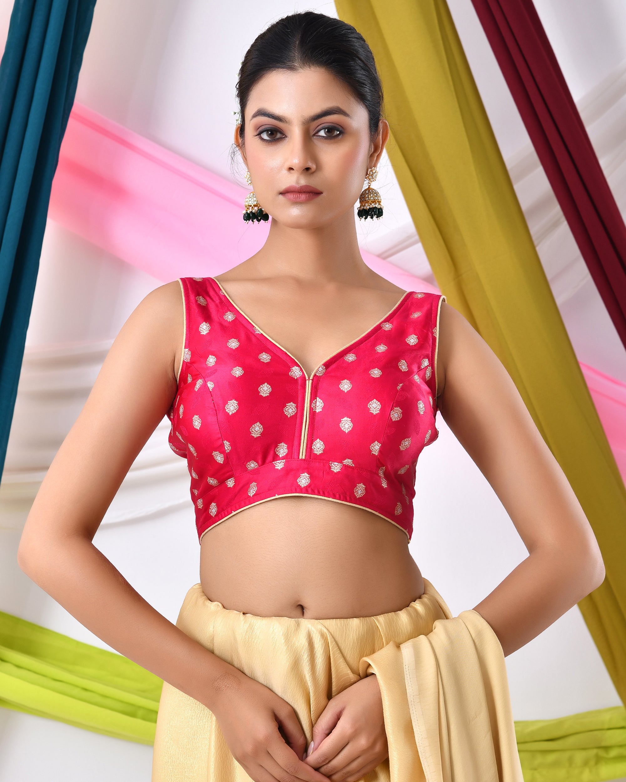 Magenta Silk V Neck Blouse With Golden Motifs